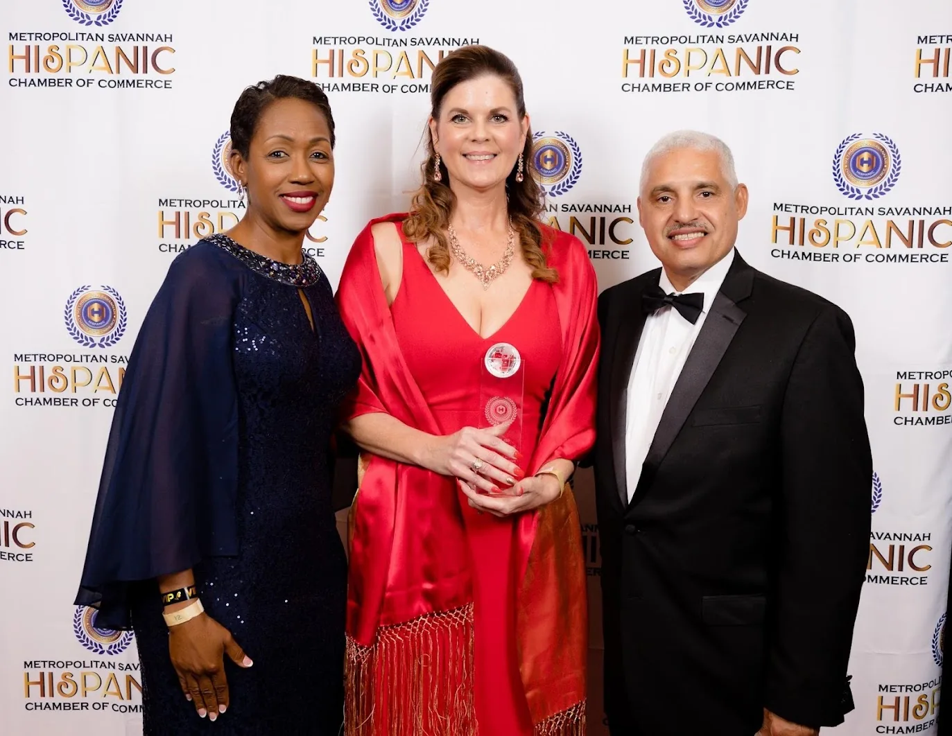 Carole Mendoza receiving the 2022 Top Home Based Business award from the Metropolitan Savannah Hispanic Chamber of Commerce