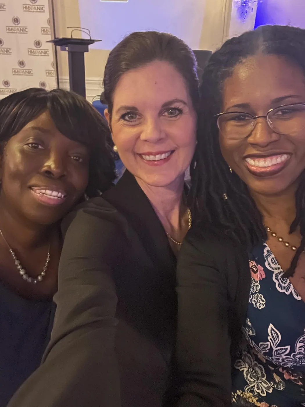 Carole Mendoza with two colleagues at a Hispanic Chamber event