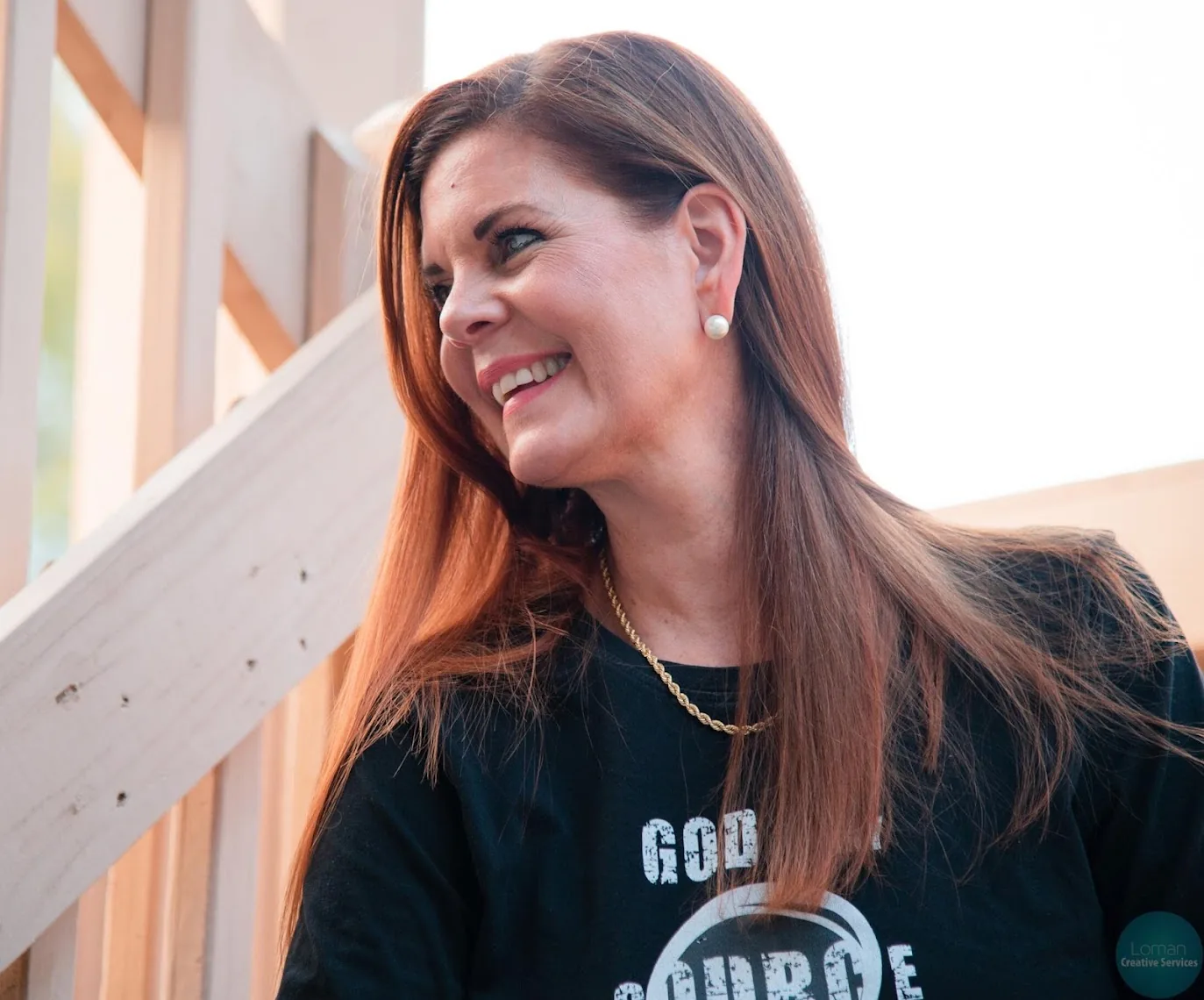 Carole Mendoza outdoors, smiling