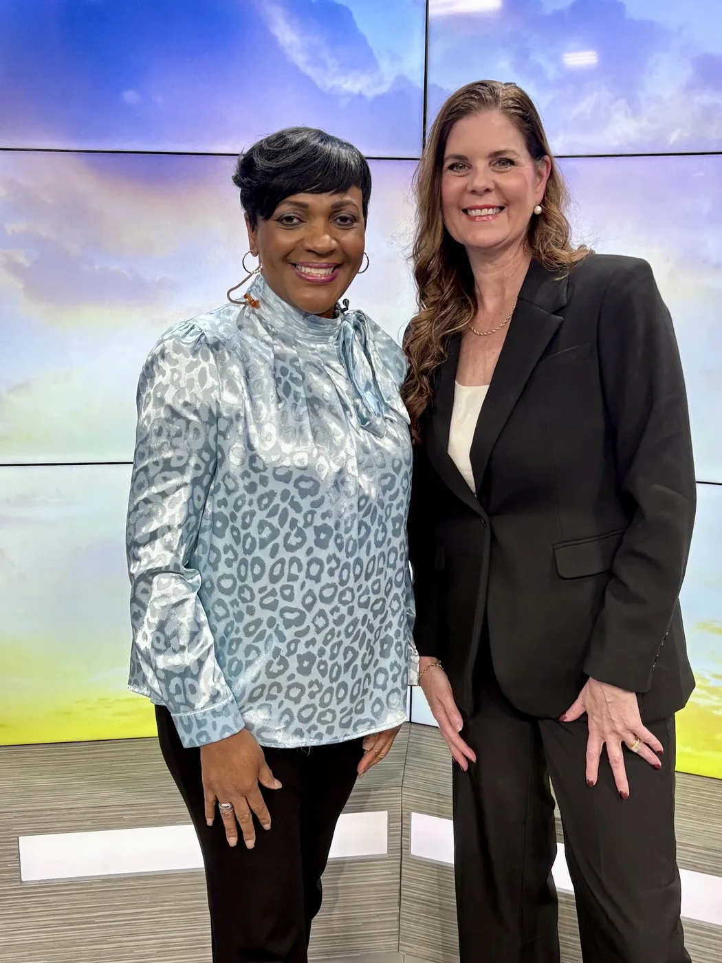 Carole Mendoza with the host on the WSAV3 studio floor